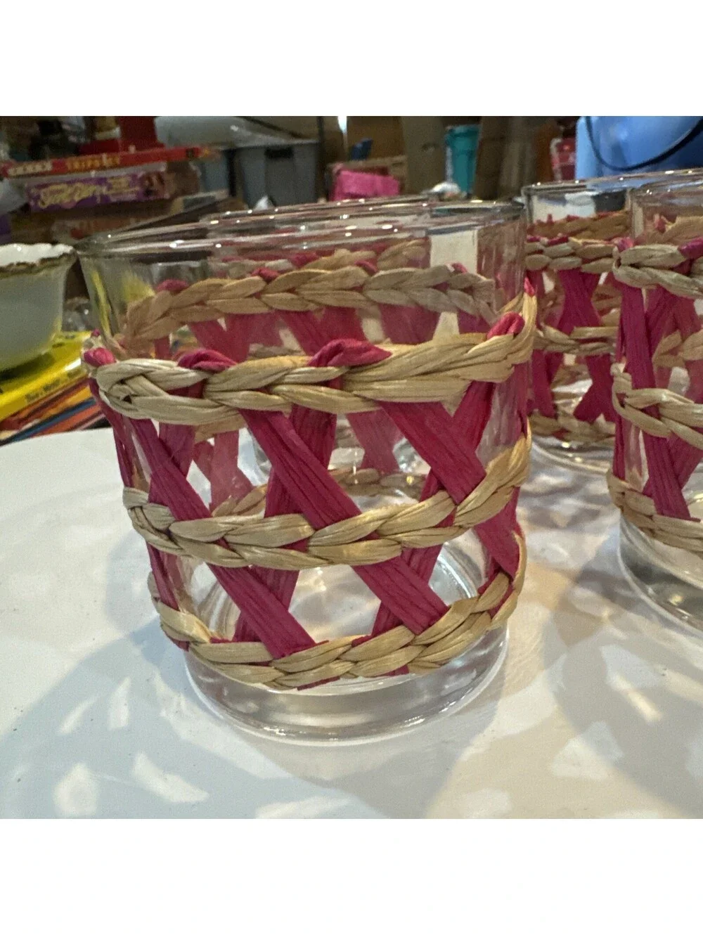 Set of 4 Pols Potten Reed glass tumbler pink and natural woven reed holder.